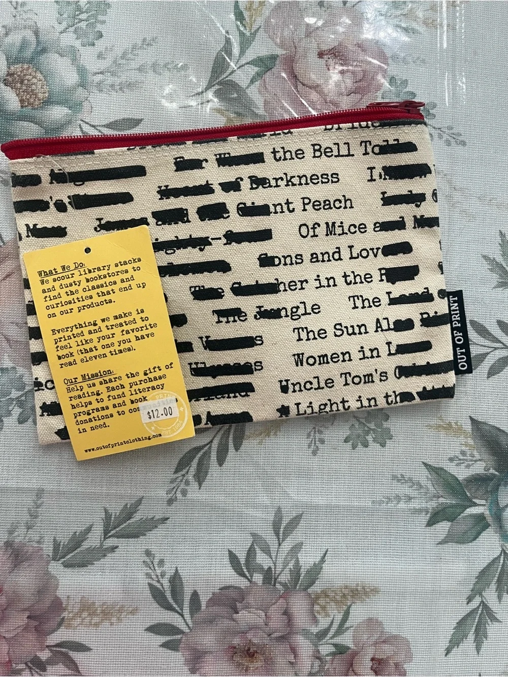 Out of Print Cream Canvas Pouch with Red Zipper